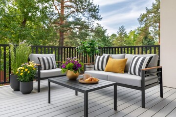 Naklejka premium Outdoor living space on balcony with furniture and plants
