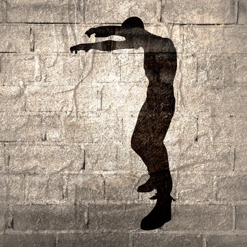 Walking zombie monster silhouette. Spooky and scary character.