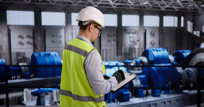Engineer Conducts Detailed Inspection Of Gas Turbine
