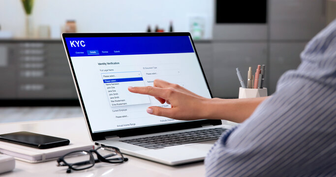 Woman Working On Digital Form At Home