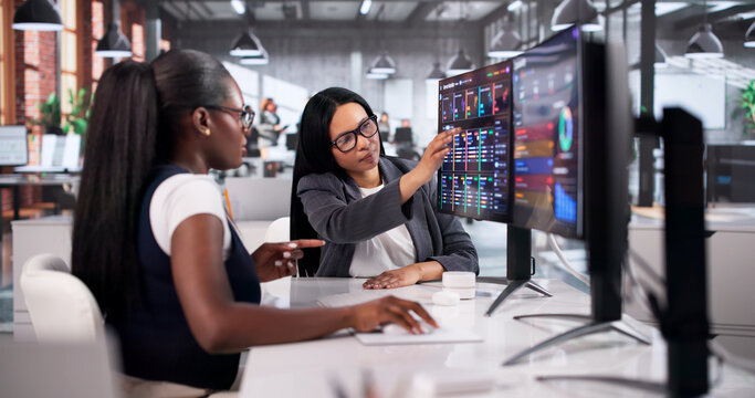 Cybersecurity Analysts Collaborate On Monitoring Threats
