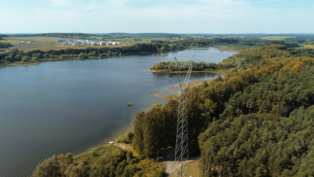 High voltage lines by scenic lake