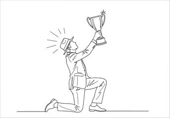 Fototapeta premium Businessman in a suit kneeling and holding a trophy celebrating a business win
