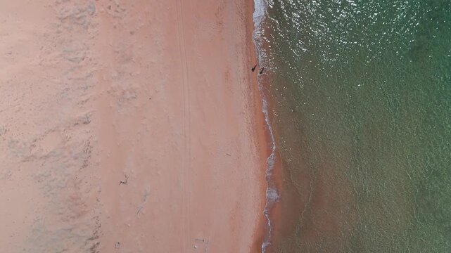 Vertical Aerial Drone View of Issos Beach Turquoise Coastline and Golden Sand in Corfu Greece