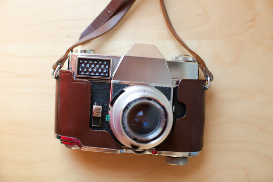 Vintage Camera Brown leather on wood table