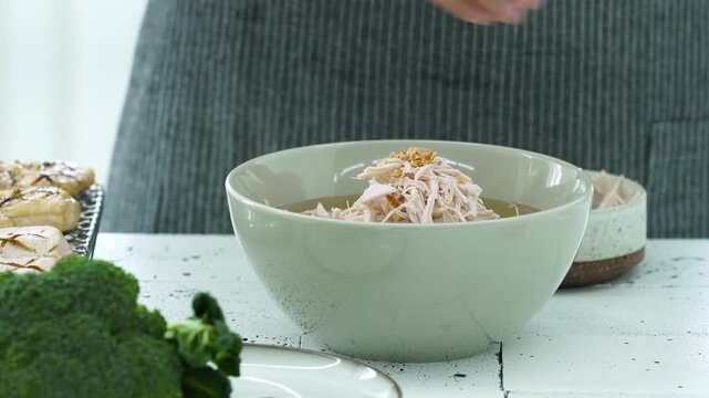 Adding Toppings on Korean Noodles
