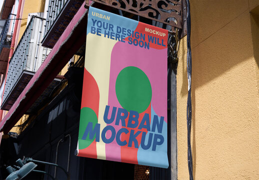 Mockup of a vibrant fly banner installed on a street in Madrid