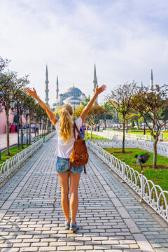 happy woman traveler with backpack enjoying view of blue mosque in istanbul, Travel, tour tourism in Turkey