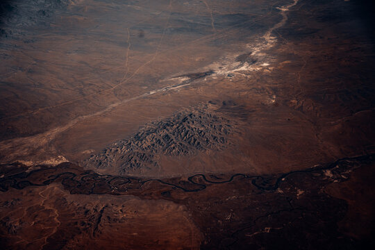 View of the Altai Mountain Region in Mongolia From an Airplane at Sunset