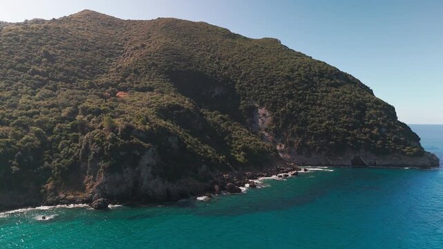 Scenic Aerial Panorama of Verdant Cliffs and Ionian Sea Coastline at Ermones Bay Greece