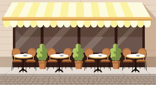 Outdoor cafe seating area with yellow awning