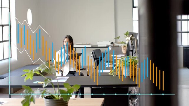 Office woman tapping tablet, visualizing business data with waveform overlays tracking across glass