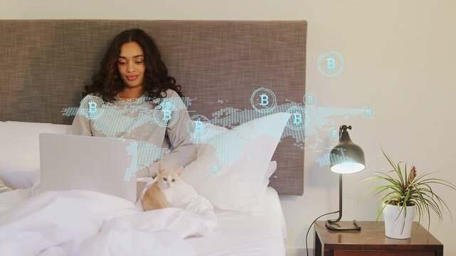 Woman tapping laptop starting map overlay, visualizing crypto flow near head and cat