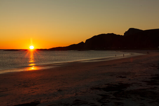 Midnight Sun Above Horizon at Bleik Beach in Norway