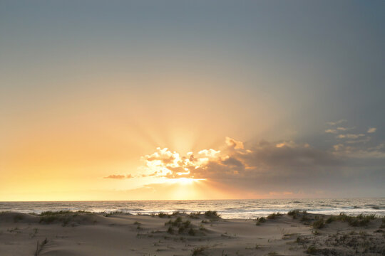 Beautiful vibrant sunrise with oceans and dunes Cape Hatteras No