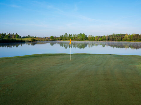 Green and flag at Dawn on Robert Trent Jones Golf Trail