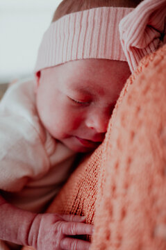 Baby girl laying on moms chest
