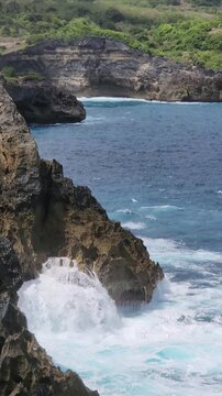 waves crashing on rocks
