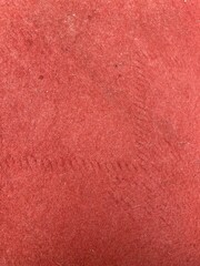 Fototapeta premium Vibrant red felt texture backdrop featuring subtle woven fabric detail and soft organic fibers for minimalist design projects and artistic creative backgrounds