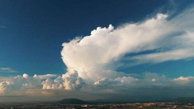 Aerial views of the countryside with clouds. Flying above the clouds