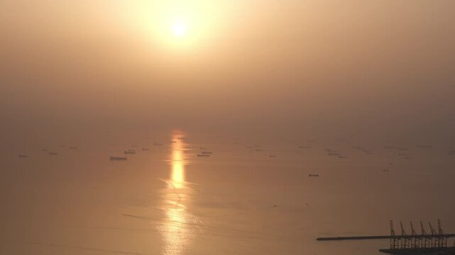 Cargo ships halted at Middle east sea due to Strait of Hormuz disruption and global trade crisis, cinematic 4k video