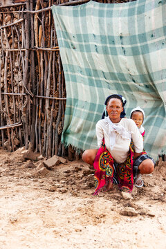 Basarwa San Mother and Child in the Kalahari Desert indigenous Southern African hunter-gatherer culture