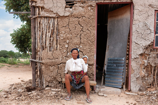 Basarwa San Mother and Child in the Kalahari Desert indigenous Southern African hunter-gatherer culture