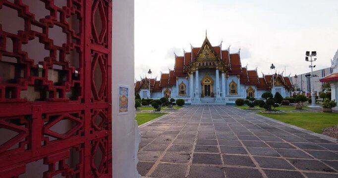 Wat Benchamabophit the Marble Temple sunset light the impressive and orderly traditional Thai architecture. Bangkok Thailand