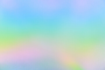 Obraz premium Abstract blur holographic rainbow foil iridescent background
