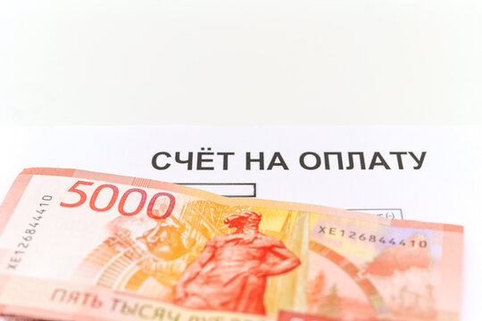 5000 ruble banknote and utility bill payment concept