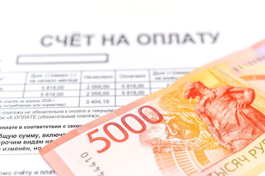 5000 ruble banknote and utility bill payment concept