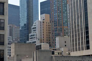 Naklejka premium Urban Rooftop Infrastructure. Highrise Building Rooftop With Utility Equipment new york