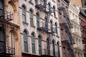 Obraz premium Historical Soho Structures With Distinctive Ironwork And Textured Facades new york