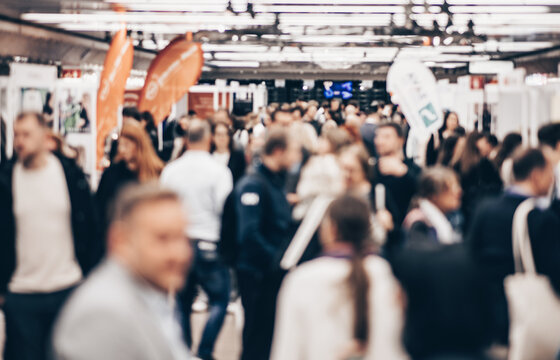 Abstract blurred people at exhibition hall of expo event trade show. Business convention show or job fair. Business concept background
