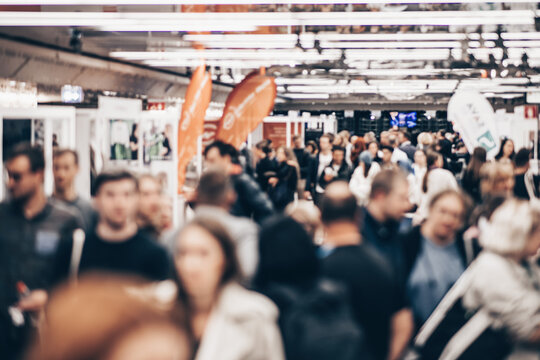 Abstract blurred people at exhibition hall of expo event trade show. Business convention show or job fair. Business concept background