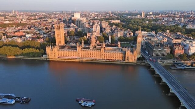 Aerial View of London, UK: Iconic Clock Tower, Big Ben and Palace of Westminster in Center of Capital City of United Kingdom of Great Britain and Northern Ireland at Sunrise