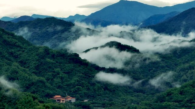Aerial view misty foggy mountain landscape with temple