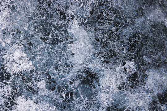 View of the intricate crystalline textures and frozen bubbles of the Svinafellsjokull glacier ice Sveitarfelagid Hornafjordur, Iceland.