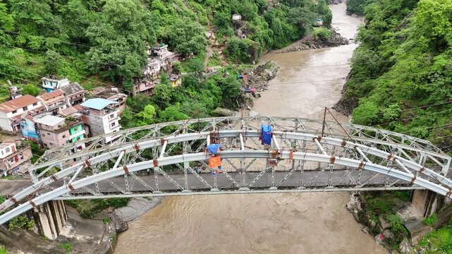 Cinematic Aerial Panorama of Himalayan Foothills and Major River Bridge 4K