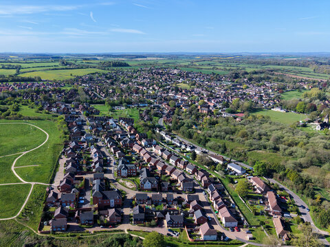 Aerial View of Overton Village Hampshire UK with Countryside Houses and Rural Landscape