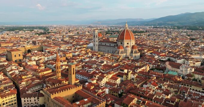 Cathedral of Saint Mary of Flower Florence Italy aerial. Medieval architecture city skyline red tiled roofs summer day. Historic landmark cultural heritage exploration Italian tourism destination high