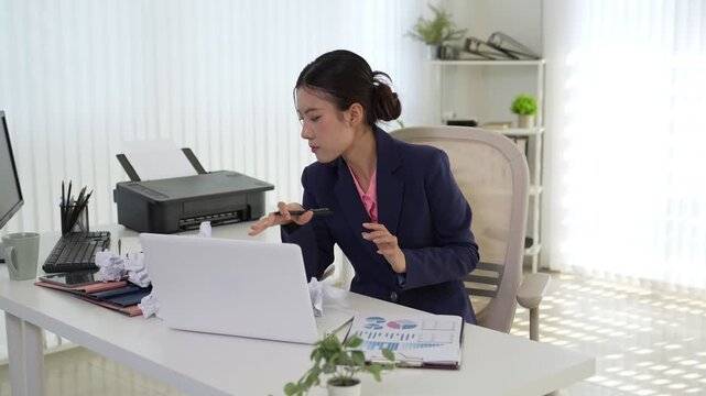 sick Asian businesswoman coughing blowing nose tissue working laptop computer experiencing cold flu symptoms struggling unwell during remote work at home