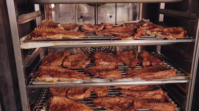 Industrial Production of Smoked Fish on Drying Racks.