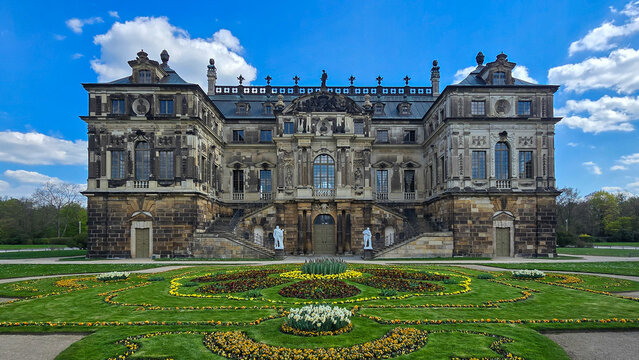 Baroque Palais in the Great Garden of Dresden with Spring Flowers and Blue Sky