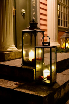 Old candle lamp on the door step