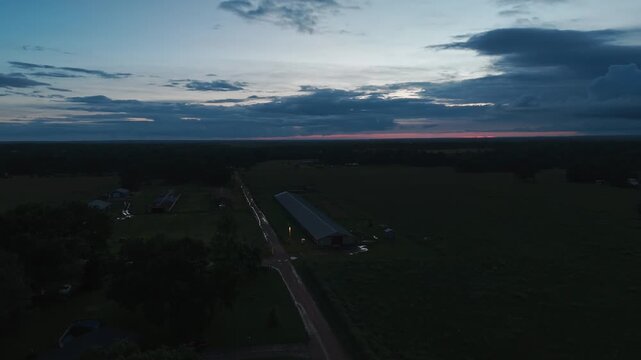 Unpaved Road In Farmlands During Sunset Near Gentry, Arkansas, United States. Aerial Shot