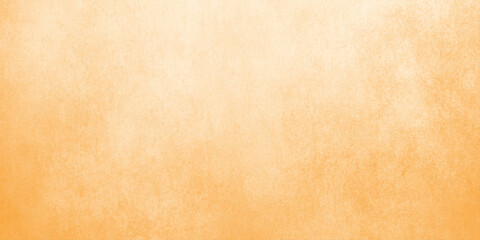Obraz premium Warm orange textured background with gradient effect for design and decoration