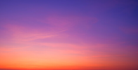 Twilight Sky Panoramic Background with Nature Gradient Light and Soft Pink Cloud on Colorful Orange and Blue Romantic Evening sky after Sundown © Prapat