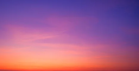 Twilight Sky Panoramic Background with Nature Gradient Light and Soft Pink Cloud on Colorful Orange and Blue Romantic Evening sky after Sundown © Prapat