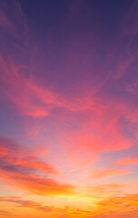 Fototapeta premium Aesthetic sky background featuring a blend of purple, magenta, and golden morning light.